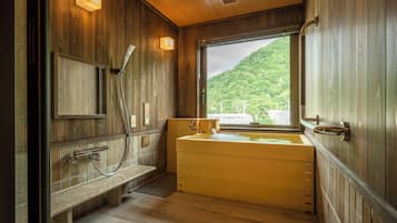 Universal Room 36sq, Non Smoking, 2nd to 3rd floor, with Hot Spring Bath | Bathroom | Combined shower/tub, spring water tub, hair dryer, towels