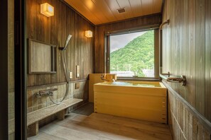 Universal Room 36sq, Non Smoking, 2nd to 3rd floor, with Hot Spring Bath | Bathroom | Combined shower/tub, spring water tub, hair dryer, towels