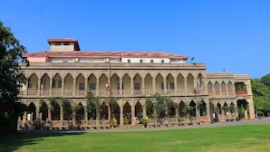 A large, historic building with multiple arches and a flat roof. - Nilambag palace (Bhavnagar)