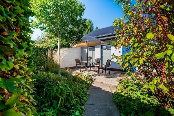 Ferienhaus Momme mit Sonnenterrasse - Deichhelden Nordstrand