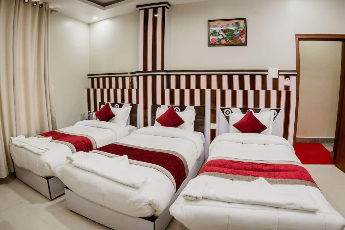 Deluxe Triple Room | Premium bedding, in-room safe, individually decorated