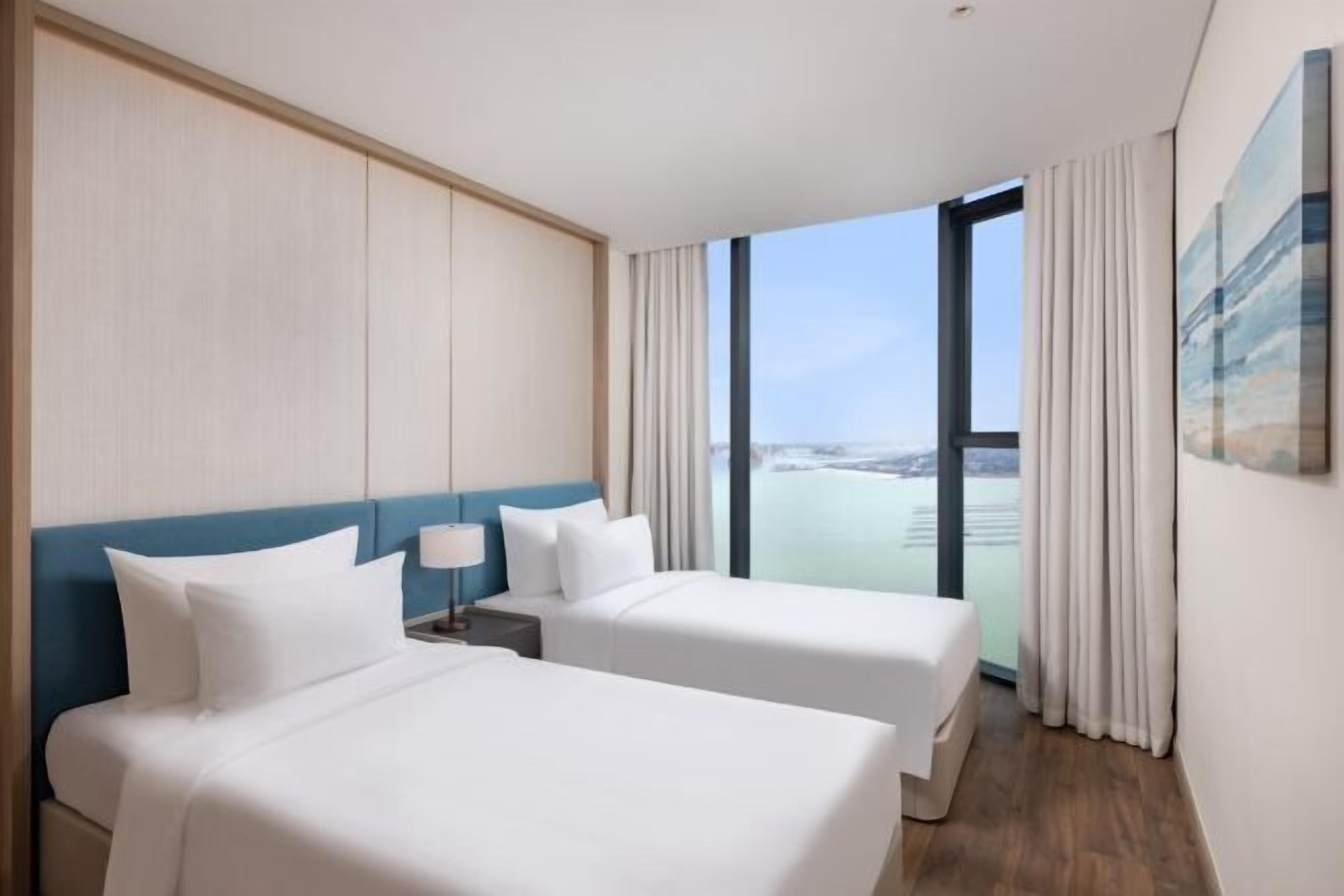 Luxe beddengoed, donsdekens, pillowtop-bedden, een minibar