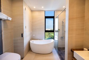 Exclusive Quadruple Room | Bathroom | Free toiletries, hair dryer, slippers, electronic bidet