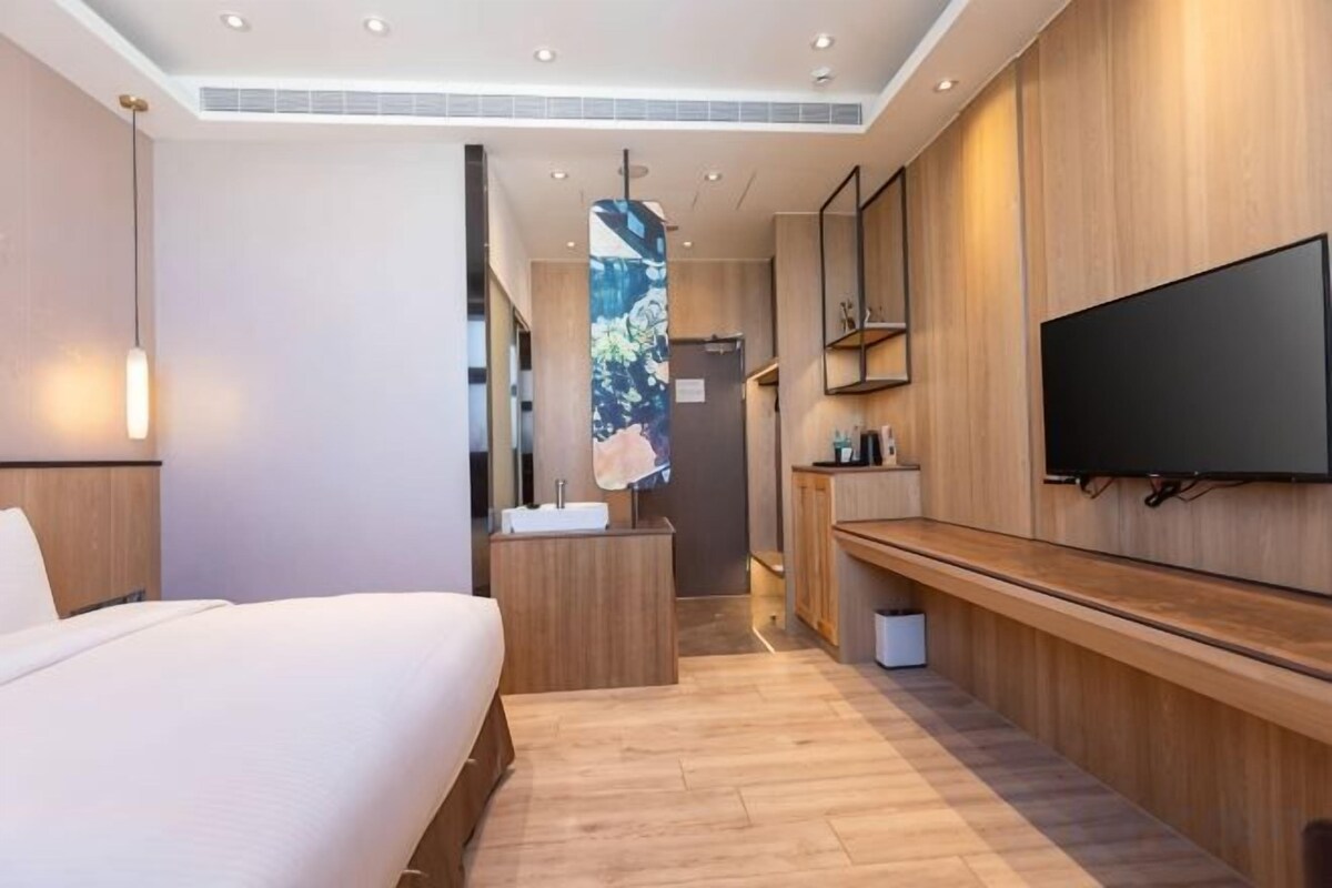 Premium bedding, down duvets, pillow-top beds, free minibar