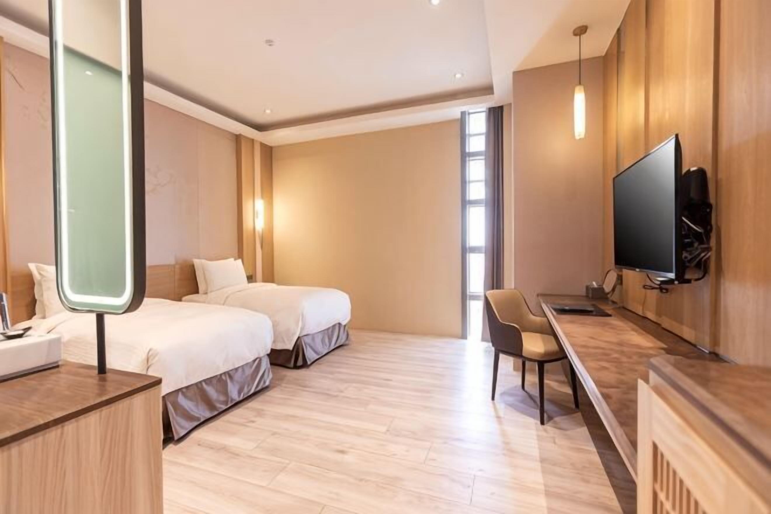 Premium bedding, down comforters, pillowtop beds, free minibar