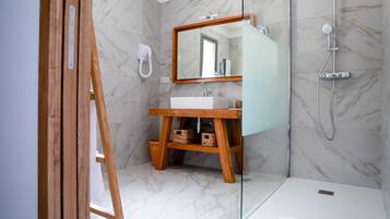 Hair dryer, towels, soap, shampoo