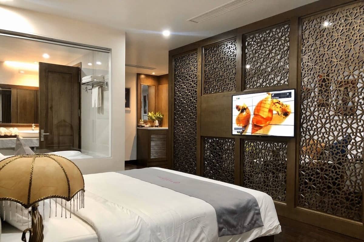 Suite ejecutiva | 1 habitación, ropa de cama de alta calidad y edredón