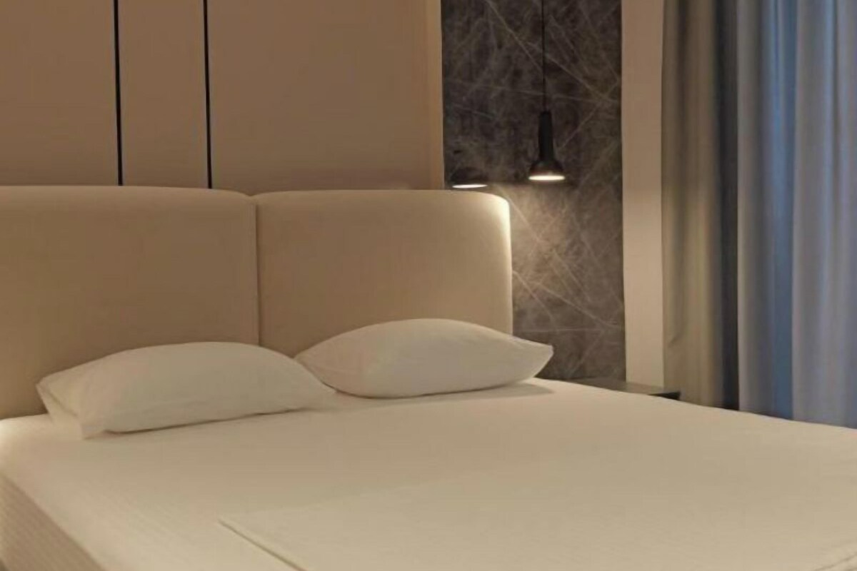 Hypo-allergenic bedding available, desk, laptop workspace, soundproofing