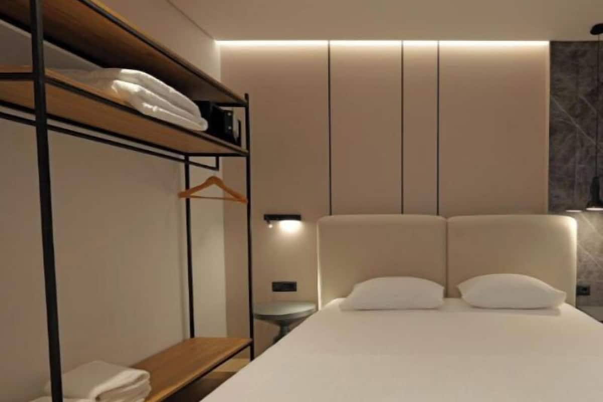 Hypo-allergenic bedding available, desk, laptop workspace, soundproofing