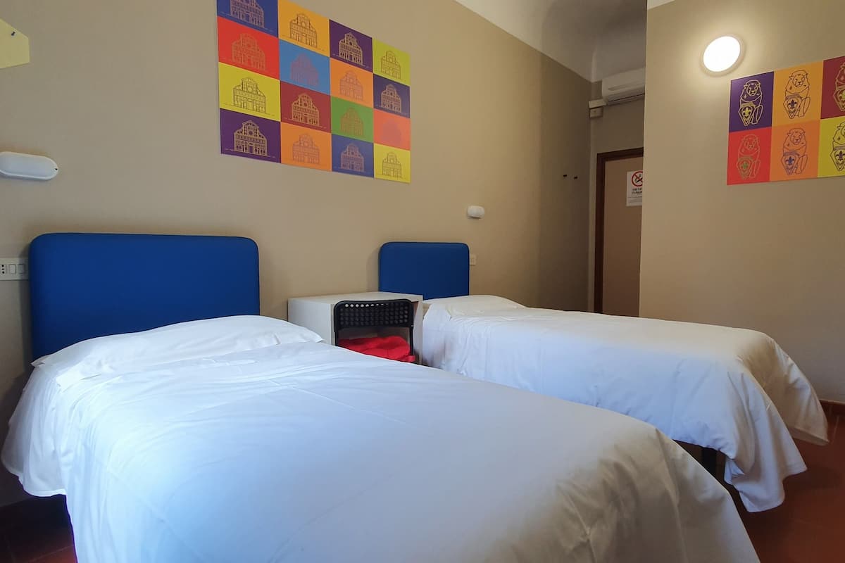 Desk, laptop workspace, blackout curtains, free WiFi
