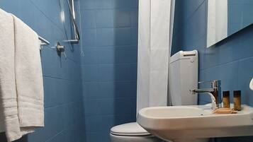 Shower, free toiletries, hair dryer, towels