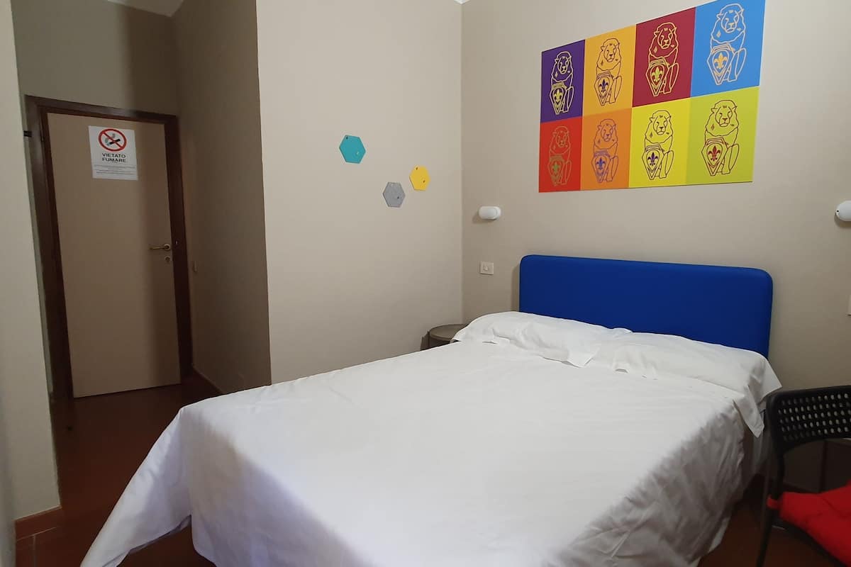 Desk, laptop workspace, blackout curtains, free WiFi