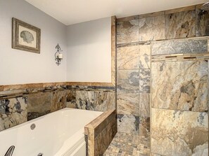 Bathtub, hair dryer, towels