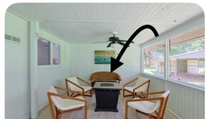 A room with a ceiling fan, a table with chairs, and a view of the outdoors. - Vacation home ,silver springs, salt spring ,Ocala world equestrian center.  (Ocala)