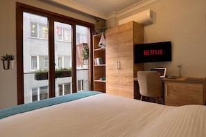 In-room safe, desk, laptop workspace, blackout curtains