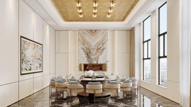 A spacious dining area with a round table set for six, surrounded by six chairs. - Silverhall Grand Hotel (Qichun)