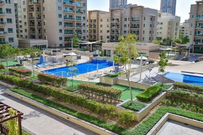 Balcony view - 1 Bedroom Pool View Apartment - OAS (Dubai)