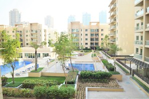 Exterior - 1 Bedroom Pool View Apartment - OAS (Dubai)