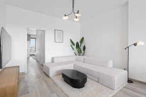 Apartamento | Área de estar | TV