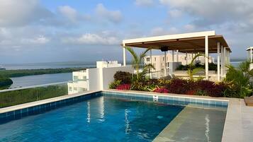 3 outdoor pools, open 7:00 AM to 9:00 PM, free cabanas