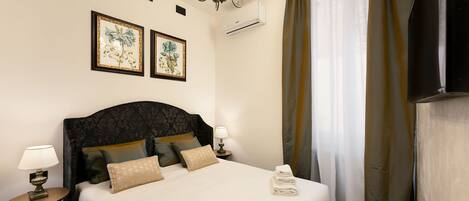 1 slaapkamer, een strijkplank/strijkijzer, gratis wifi