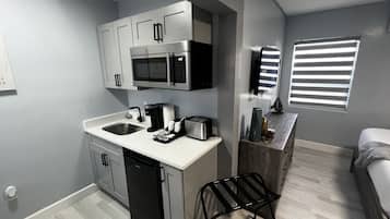 Fridge, microwave, coffee/tea maker, toaster