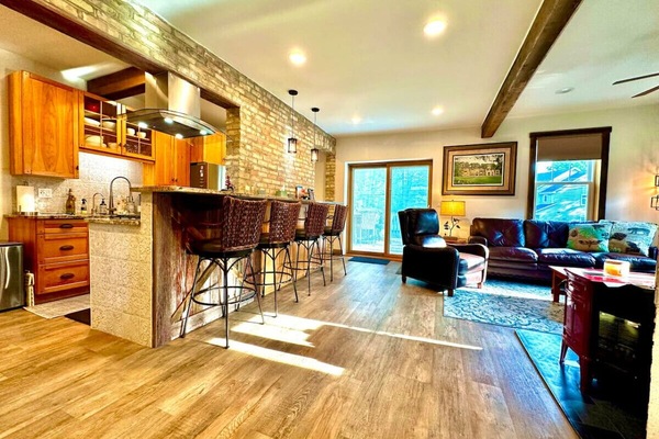 This stunning and spacious living room welcomes you as you enter Be Still and Know. Welcome Home!!