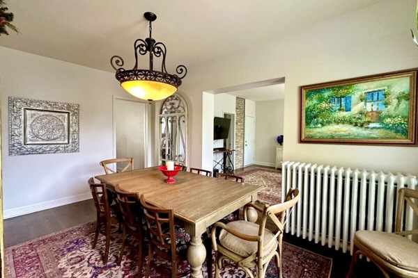 Original art and unique decor add to the Euro-charm this apartment exudes