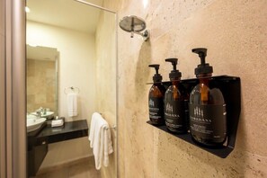 Bathtub, eco-friendly toiletries, hair dryer, towels