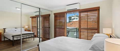 2 habitaciones, tabla de planchar con plancha, wifi y ropa de cama