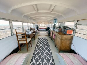 1 bedroom, desk, WiFi, bed sheets - The Nowhere Bus · Off-Grid, Stargazing, Nic Cage Themed School Bus (Beryl)