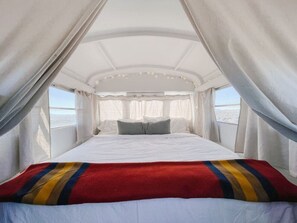 1 bedroom, desk, WiFi, bed sheets - The Nowhere Bus · Off-Grid, Stargazing, Nic Cage Themed School Bus (Beryl)