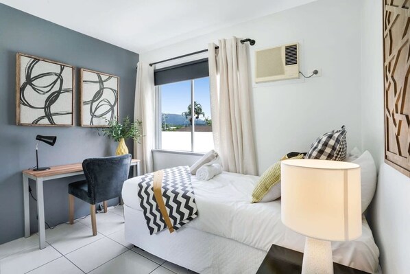 2 bedrooms, desk, iron/ironing board, travel cot