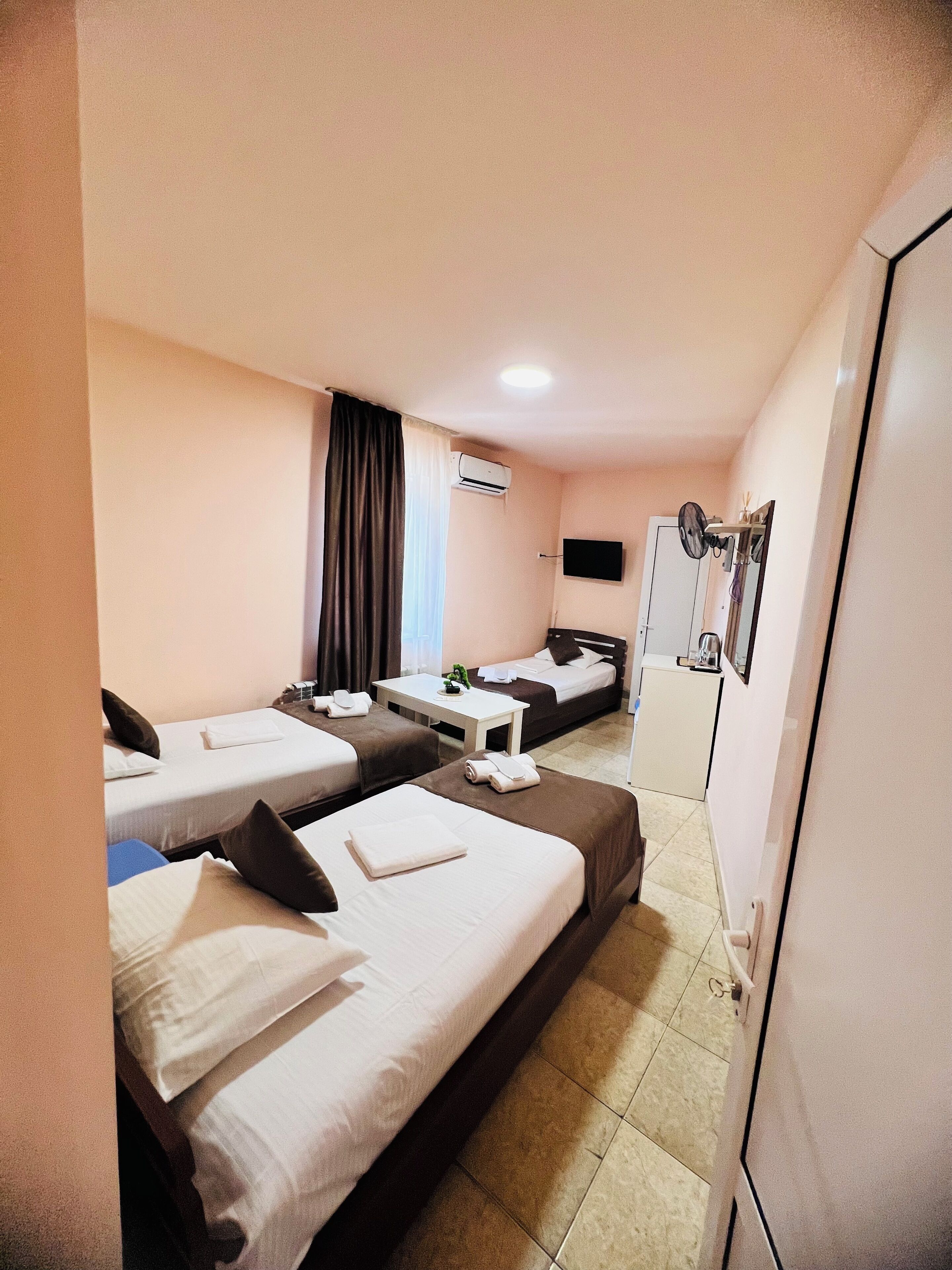 elite triple room | desk, blackout curtains, iron/ironing board, free wifi