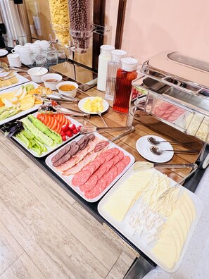 Daily buffet breakfast (USD 10 per person)