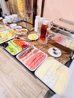 Daily buffet breakfast (USD 10 per person)