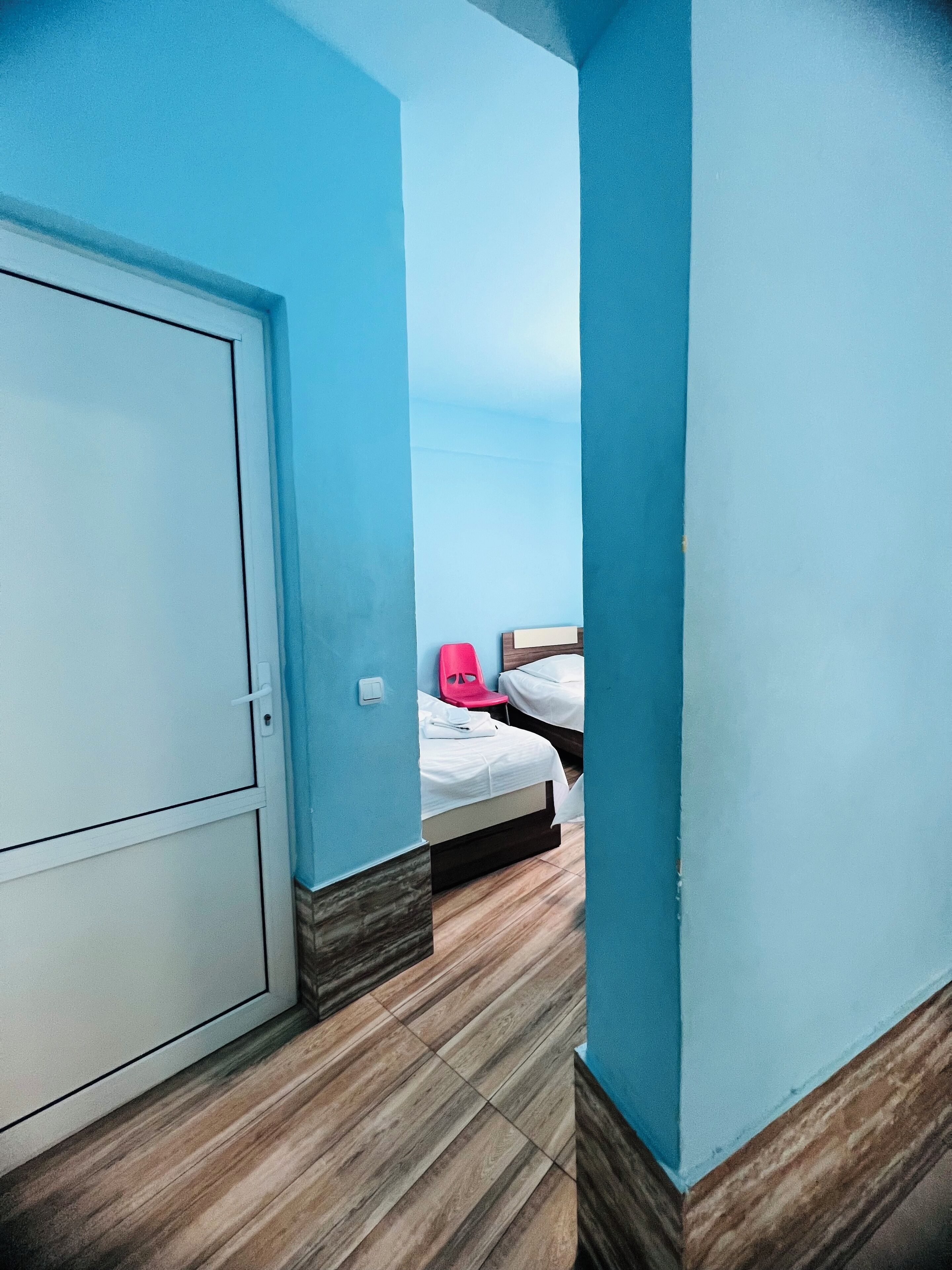 family room | desk, blackout curtains, iron/ironing board, free wifi