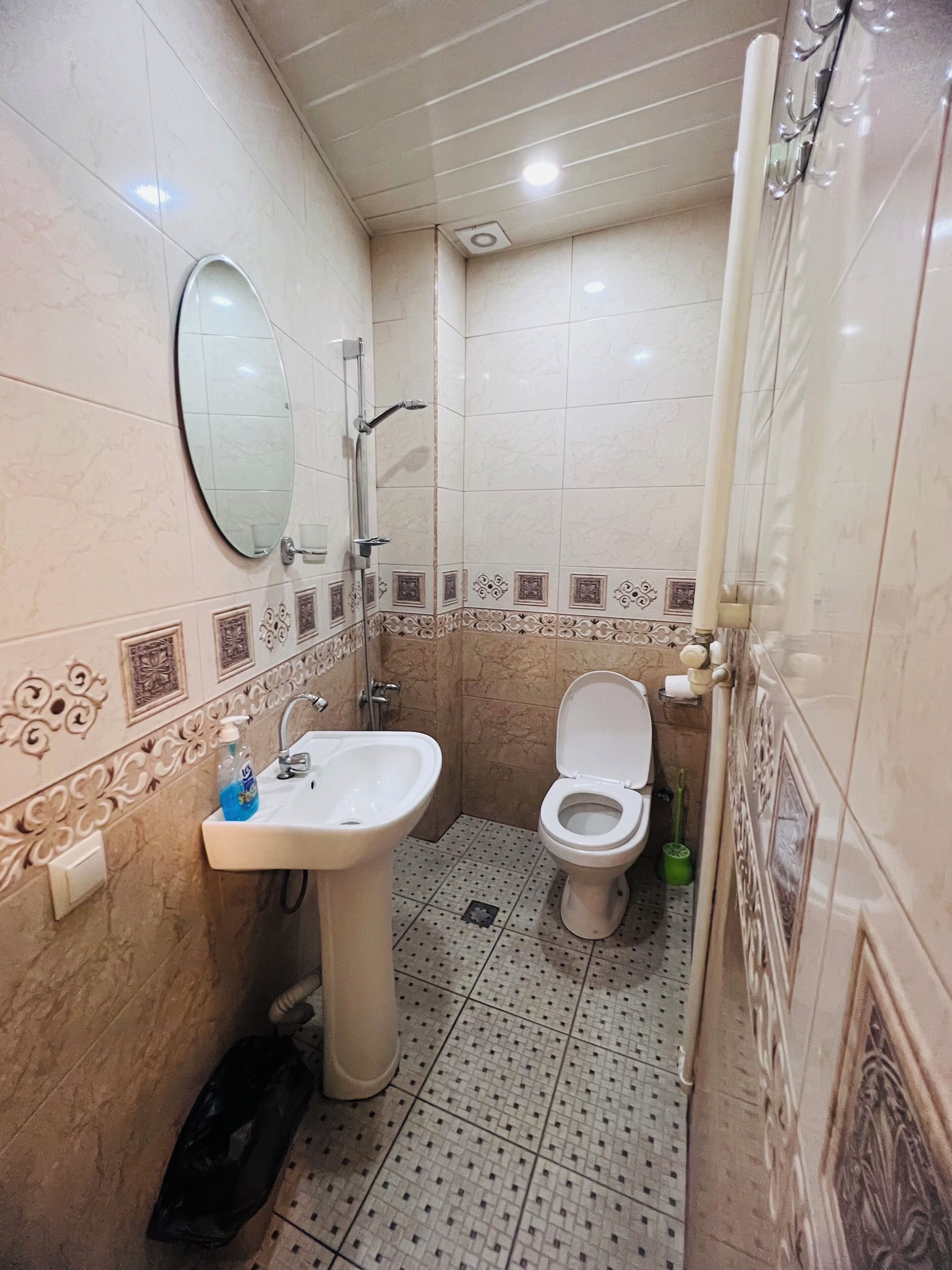 standard quadruple room | bathroom | shower, hair dryer, slippers, towels