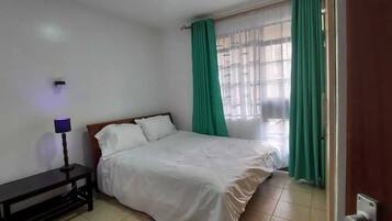 2 habitaciones, tabla de planchar con plancha y wifi gratis