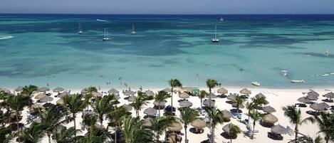 On the beach, sun-loungers, beach towels