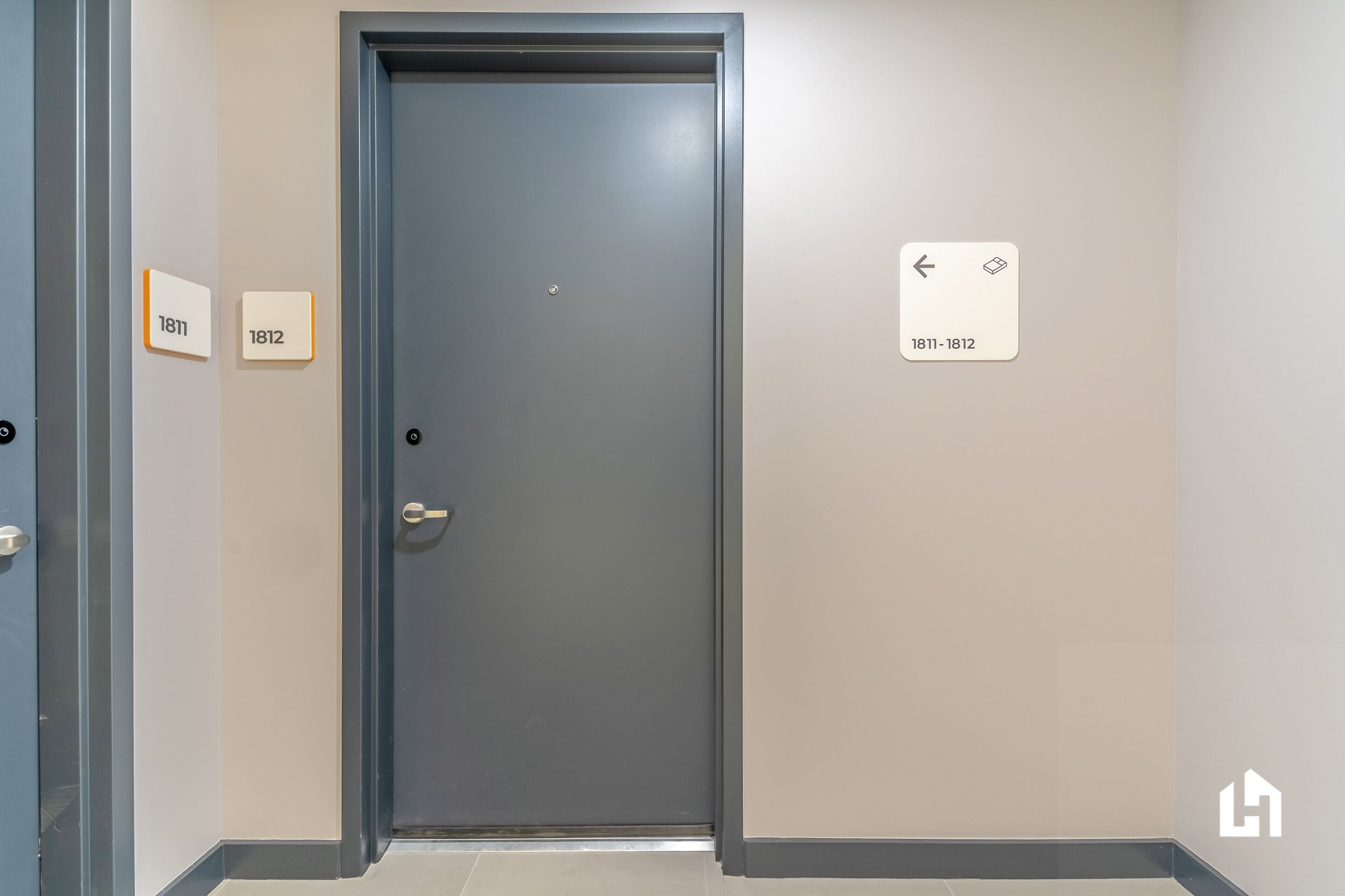 A door with a number plate indicating room 1812.