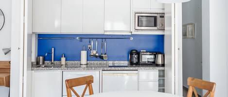 Fridge, microwave, toaster, cookware/dishes/utensils