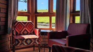 Cabaña familiar | Área de sala de estar | Televisión de pantalla plana