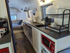 Fridge, microwave, stovetop, coffee/tea maker