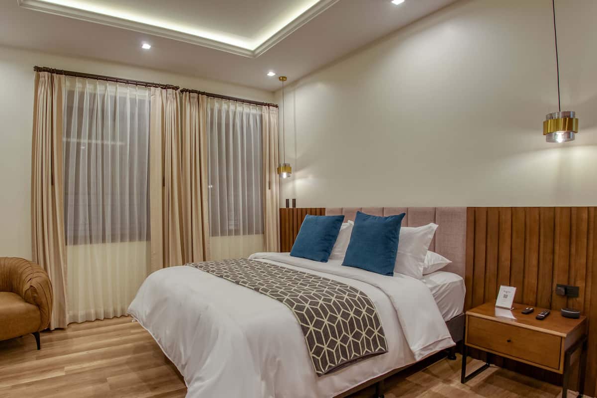 Deluxe kamer, 1 slaapkamer | 1 slaapkamer, luxe beddengoed, donzen dekbedden, pillowtop-bedden