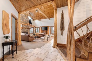 Smart TV, fireplace, table football, books