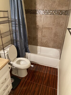 Shower, towels, soap, toilet paper