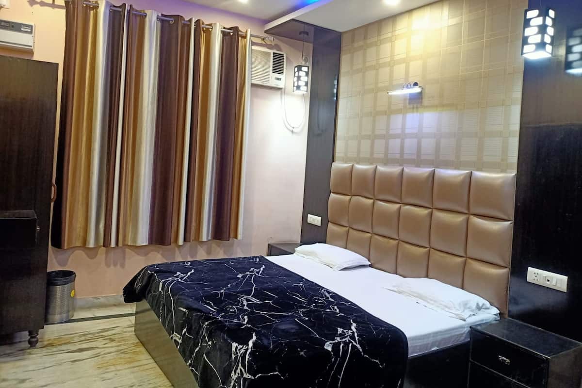 Habitación doble Deluxe | Ropa de cama de alta calidad, edredón y camas con efecto memoria