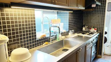 Executive Villa | Private kitchen | Fridge, microwave, rice cooker, cookware/dishes/utensils