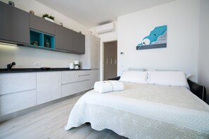 1 habitación, tabla de planchar con plancha, wifi y ropa de cama 